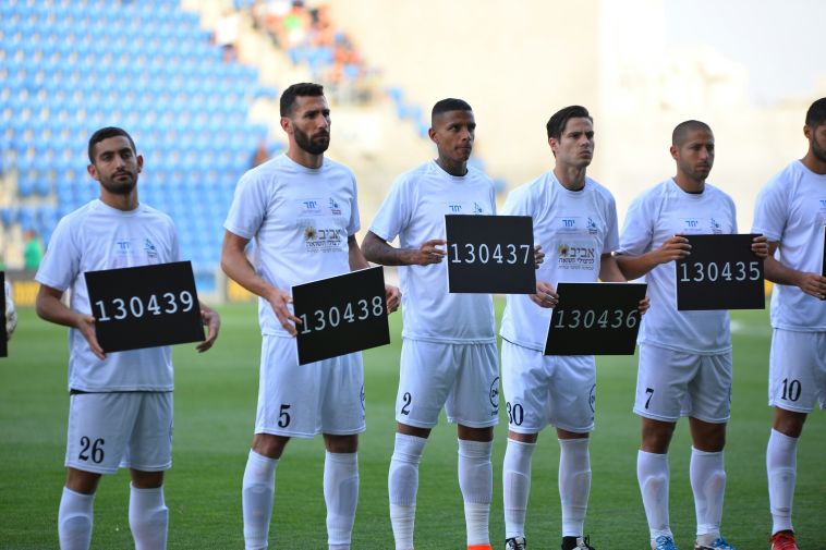 טקס להנצחת השואה. צילום: אריאל שלום