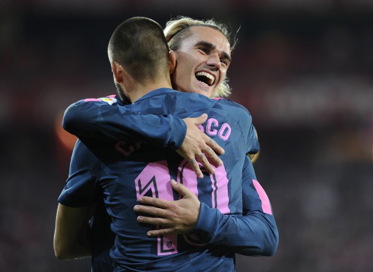 קראסקו וגריזמן חוגגים את הניצחון (AFP)