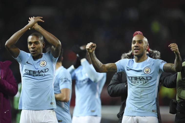 שחקני סיטי חוגגים את הניצחון בדרבי (AFP)