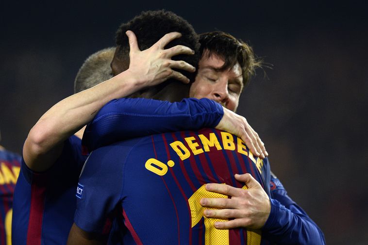 מסי ודמבלה מתחבקים (AFP)