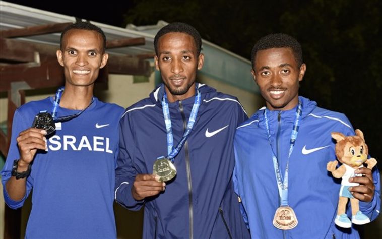 איימרו עלמיה, גירמה אמרה וטדסה גטהון על הפודיום (צילום: טיבור יגר)