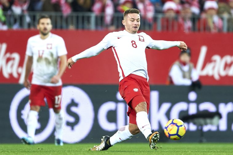 קארול לינטי במדי נבחרת פולין (GETTY IMAGES)