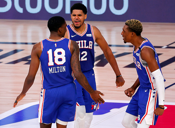 ריצ'רדסון והאריס מברכים את מילטון