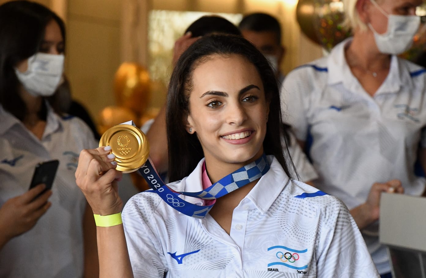 לינוי אשרם בנחיתת הנבחרת הישראלית, נתב"ג, 11 באוגוסט 2021