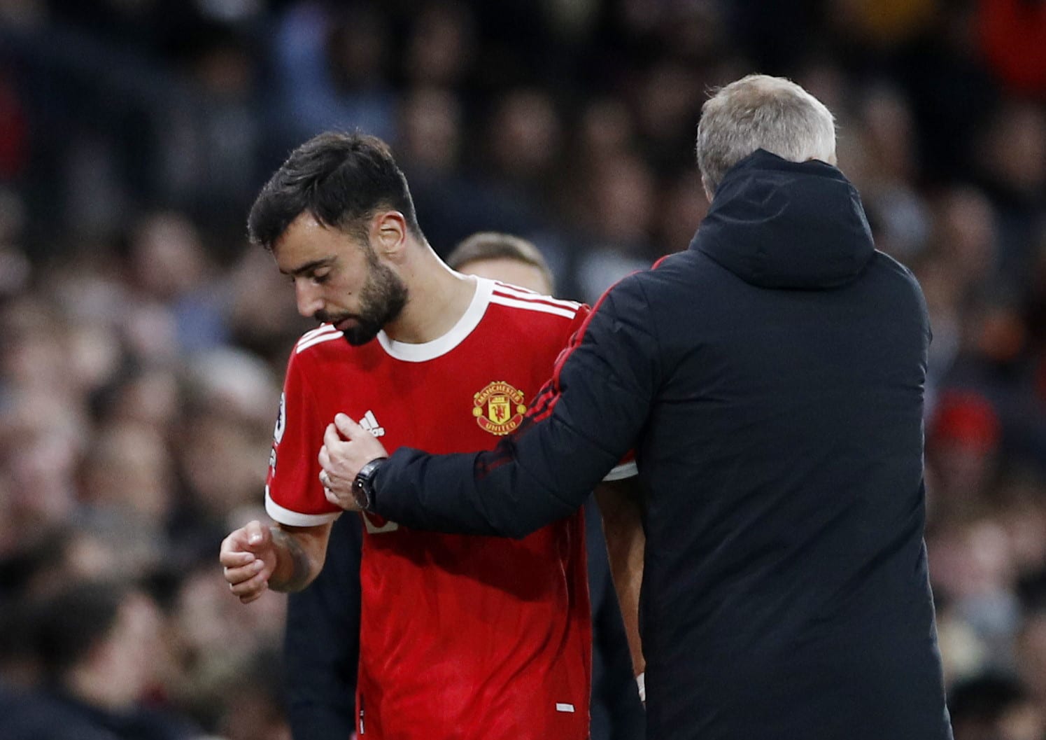 ברונו פרננדש שחקן מנצ'סטר יונייטד עם אולה גונאר סולשיאר