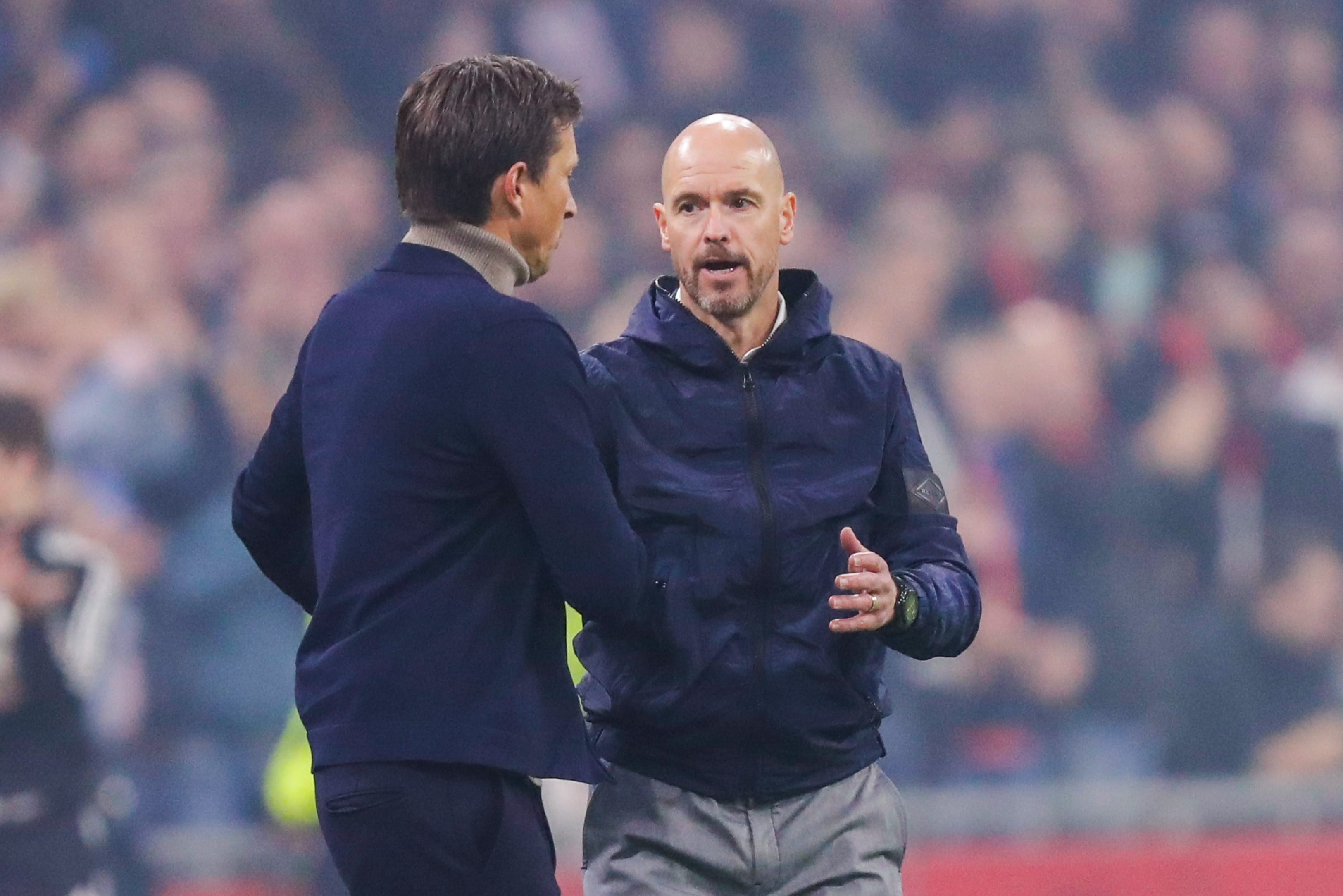 אריק טן האח מאמן אייאקס עם רוג'ר שמידט מאמן פ.ס.וו איינדהובן