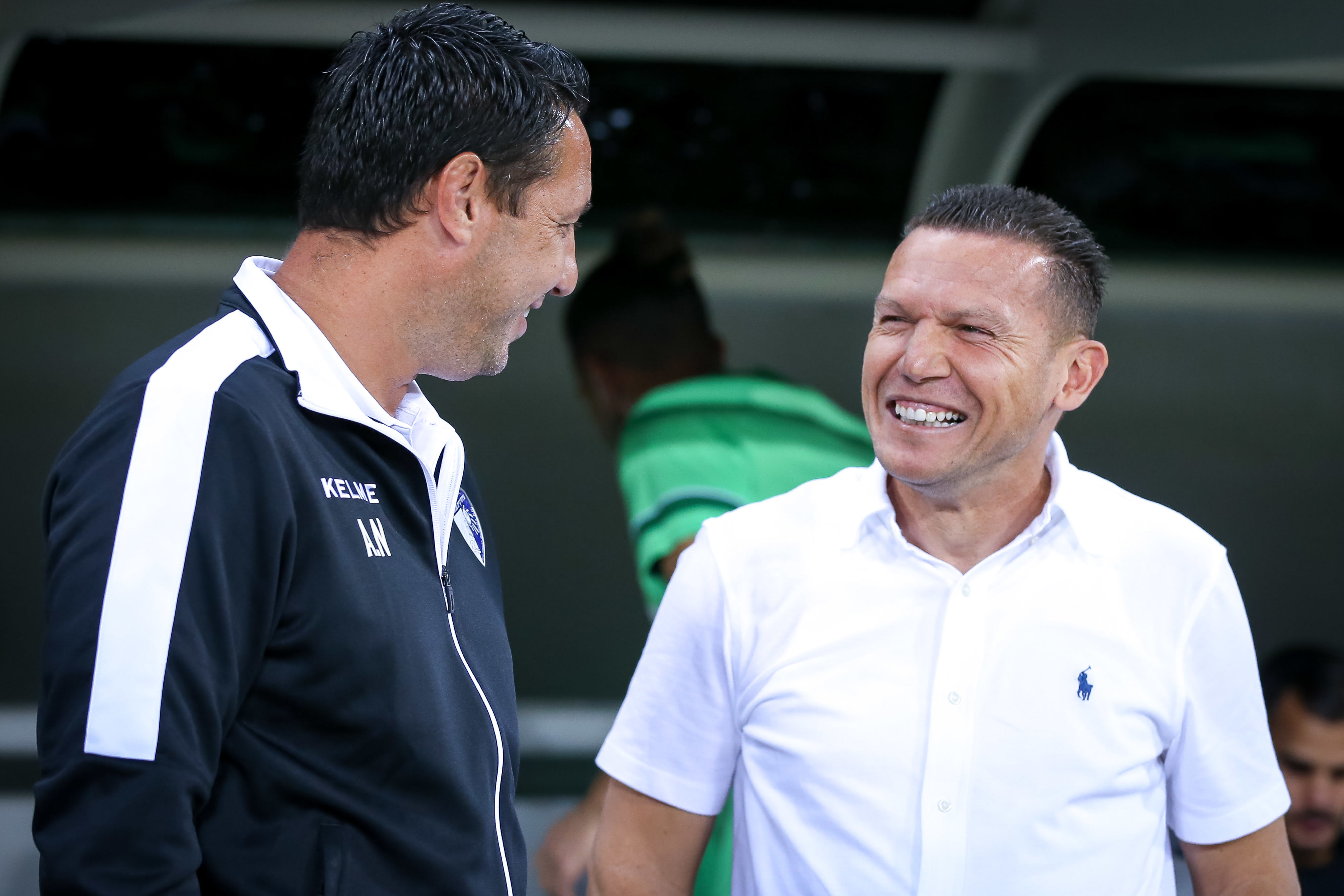 מאמן מכבי חיפה ברק בכר עם מאמן עירוני קרית שמונה עמיר נוסבאום