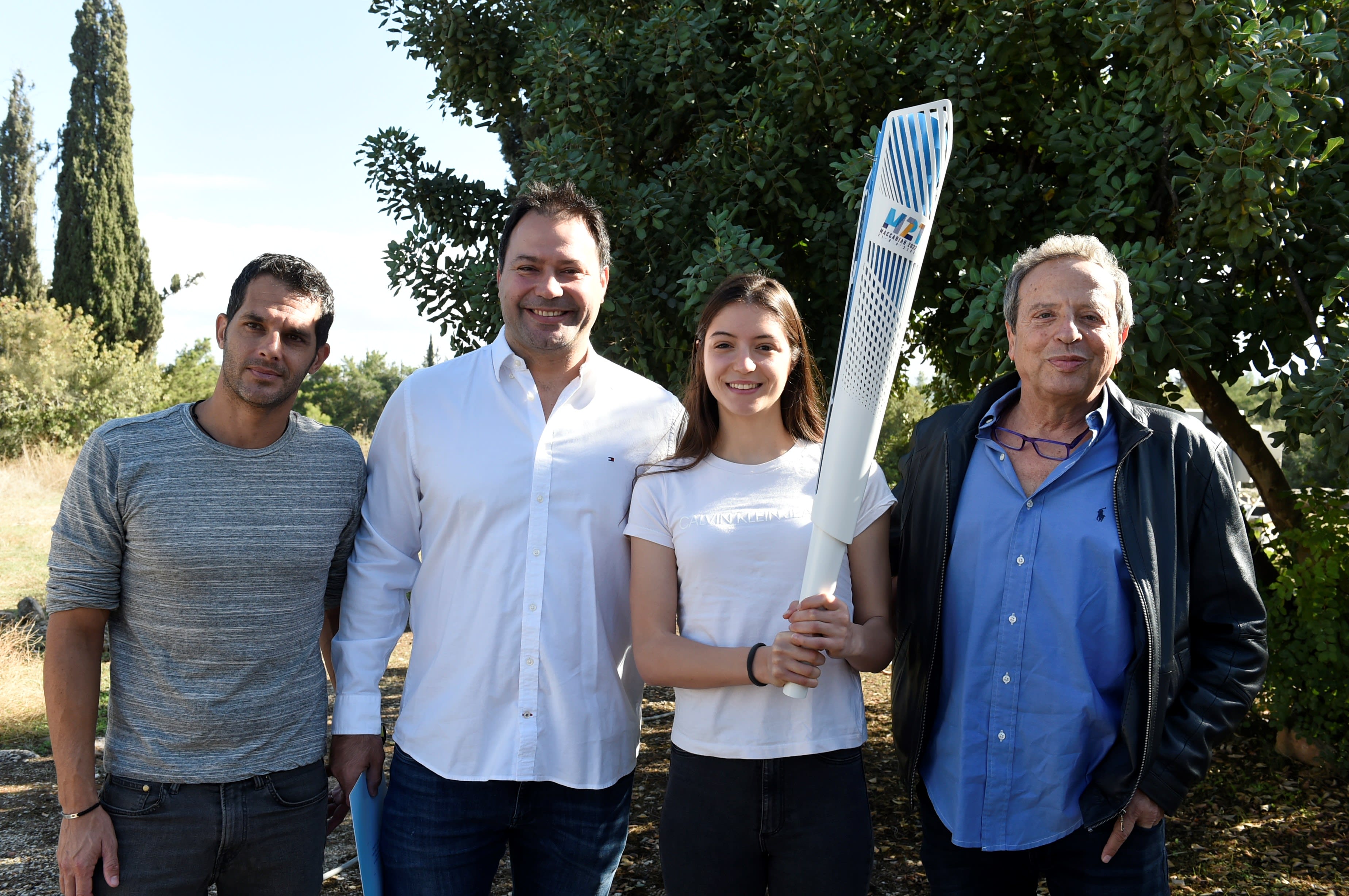 מימין לשמאל: אמיר פלד יו"ר מכבי תנועה עולמית, אבישג סמברג זוכת מדלית הארד בטאקוונדו, אריק זאבי המדליסט האולימפי ויו"ר המכביה  ורואי הסינג סמנכ"ל מכבי תנועה עולמית