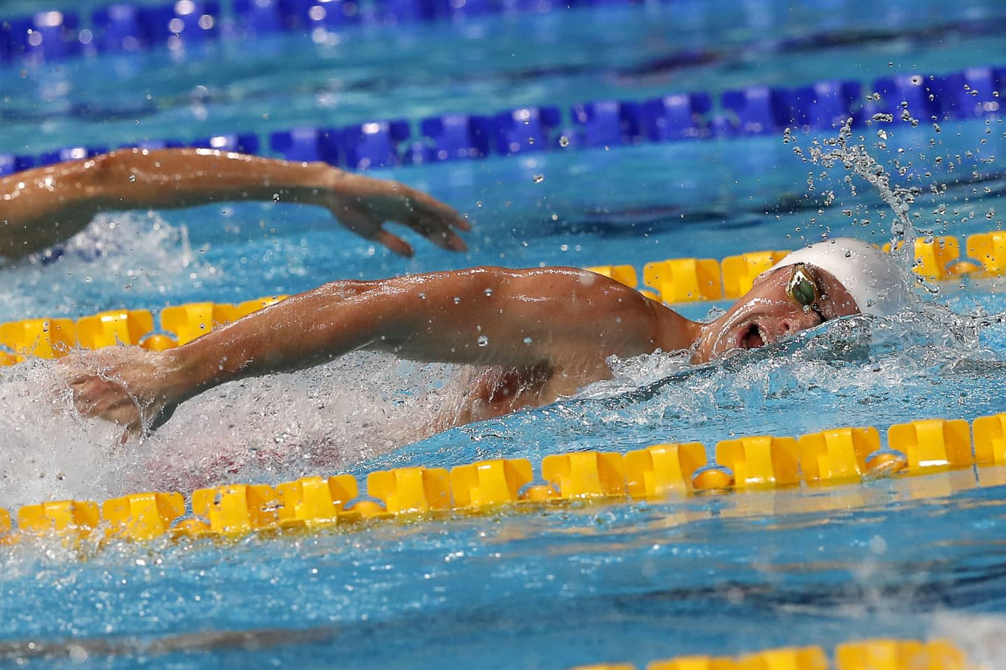 דניס לוקטב, שחיין ישראלי