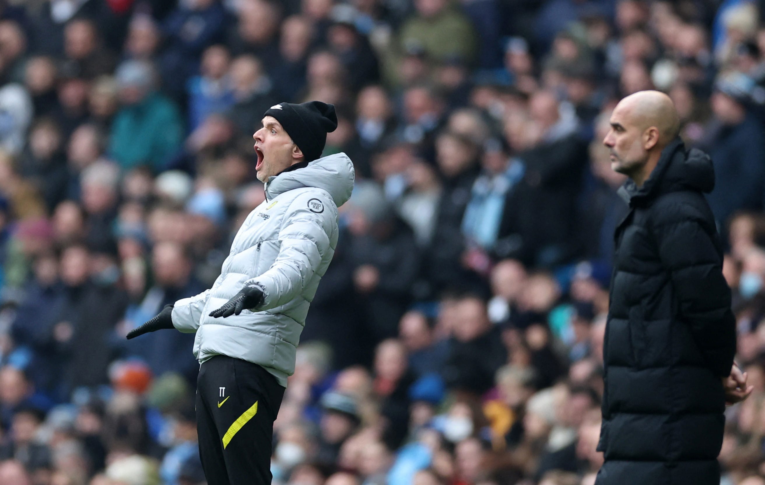 מאמן צ'לסי תומאס טוכל עם מאמן מנצ'סטר סיטי פפ גווארדיולה