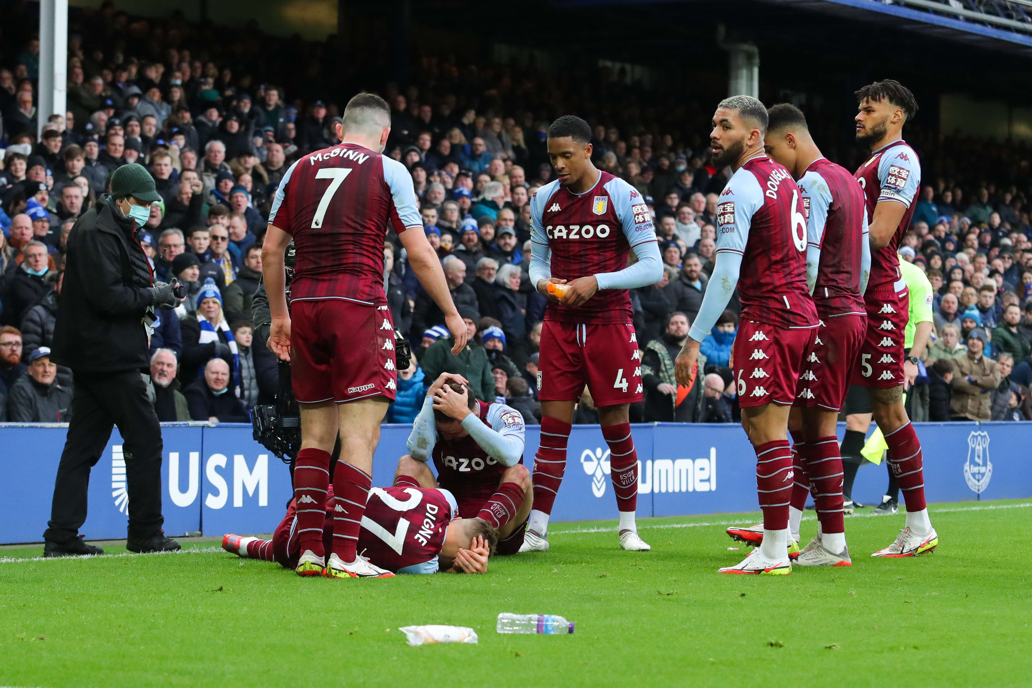 Aston Villa players around Luca Dean, Matty Cash hit by objects thrown at them