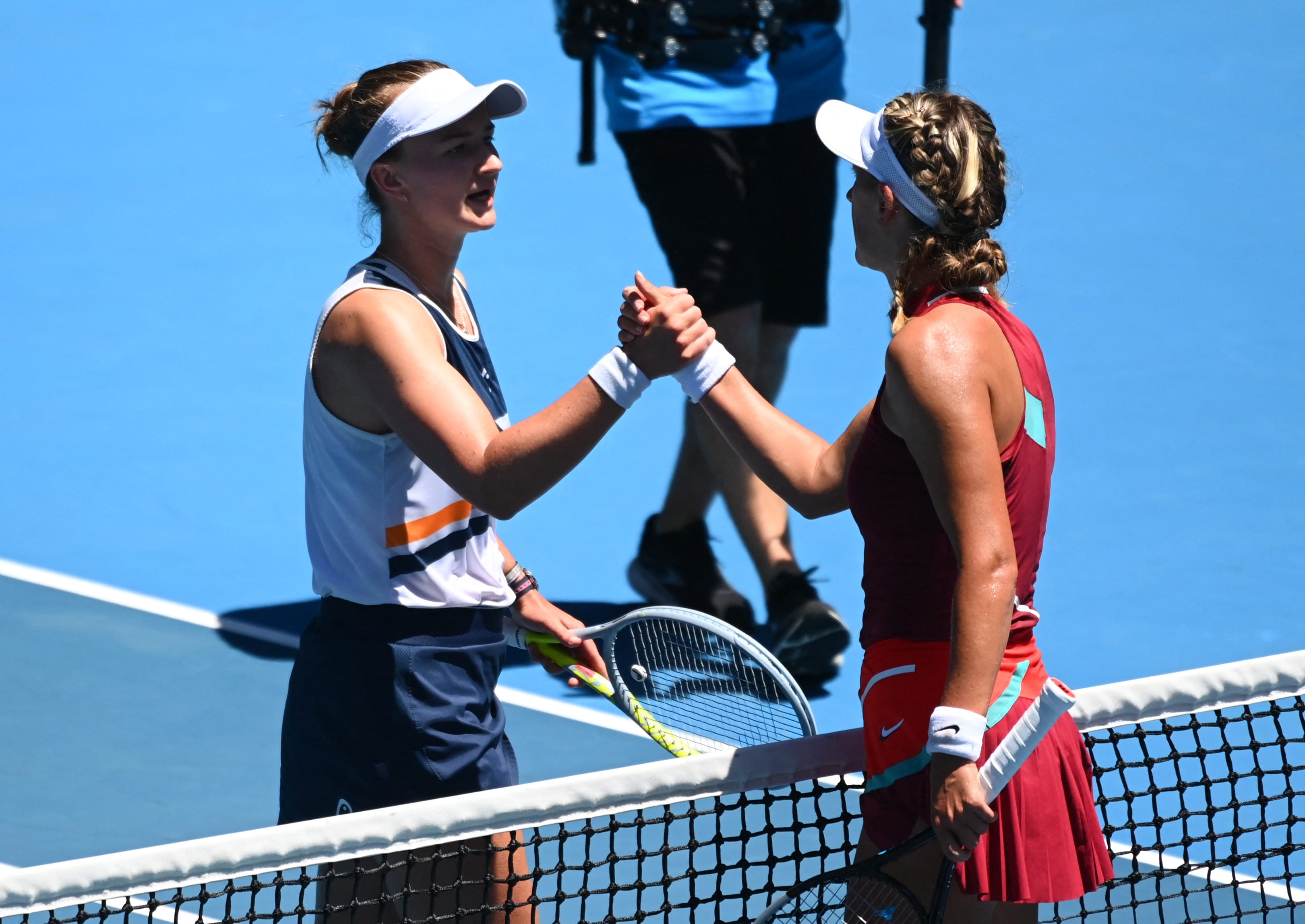 הטניסאית הצ'כית ברבורה קרייצ'יקובה עם הטניסאית הבלארוסית ויקטוריה אזרנקה