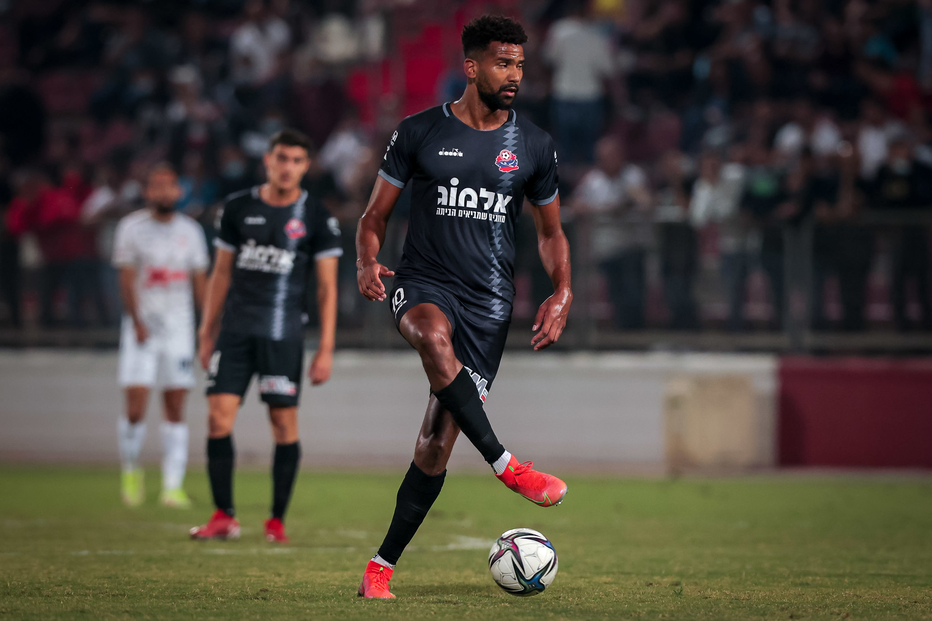 קווין טאפוקו, קשר הפועל חיפה