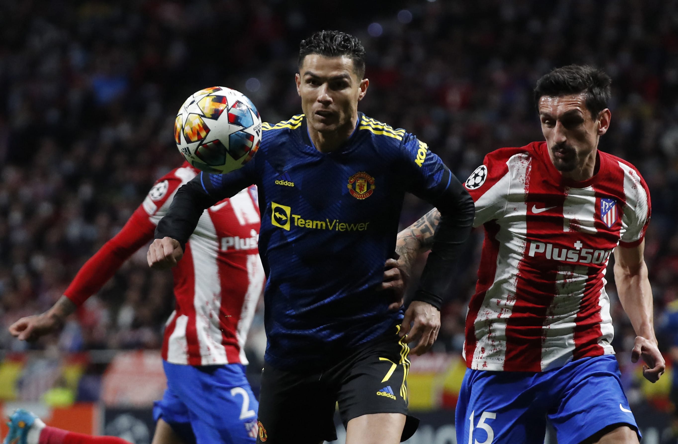 Manchester United player Cristiano Ronaldo against Atletico Madrid player Stefan Savic