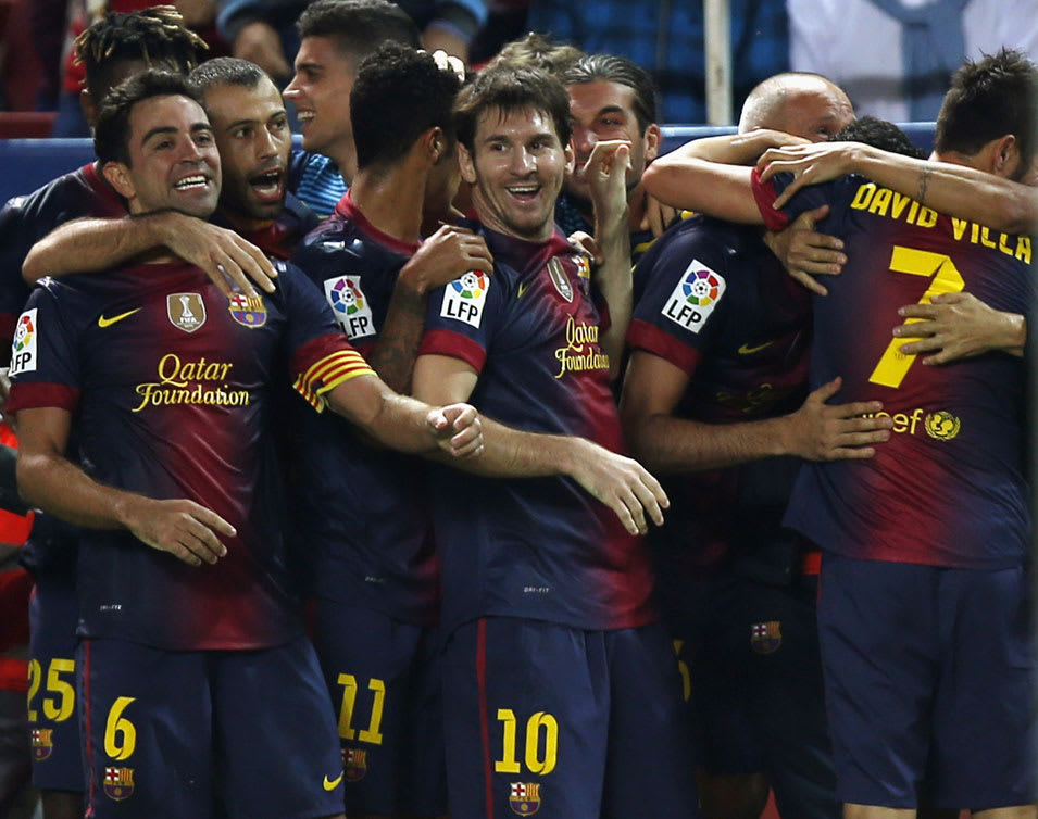 שחקני ברצלונה ססק פברגאס, ליאונל מסי חוגגים שער