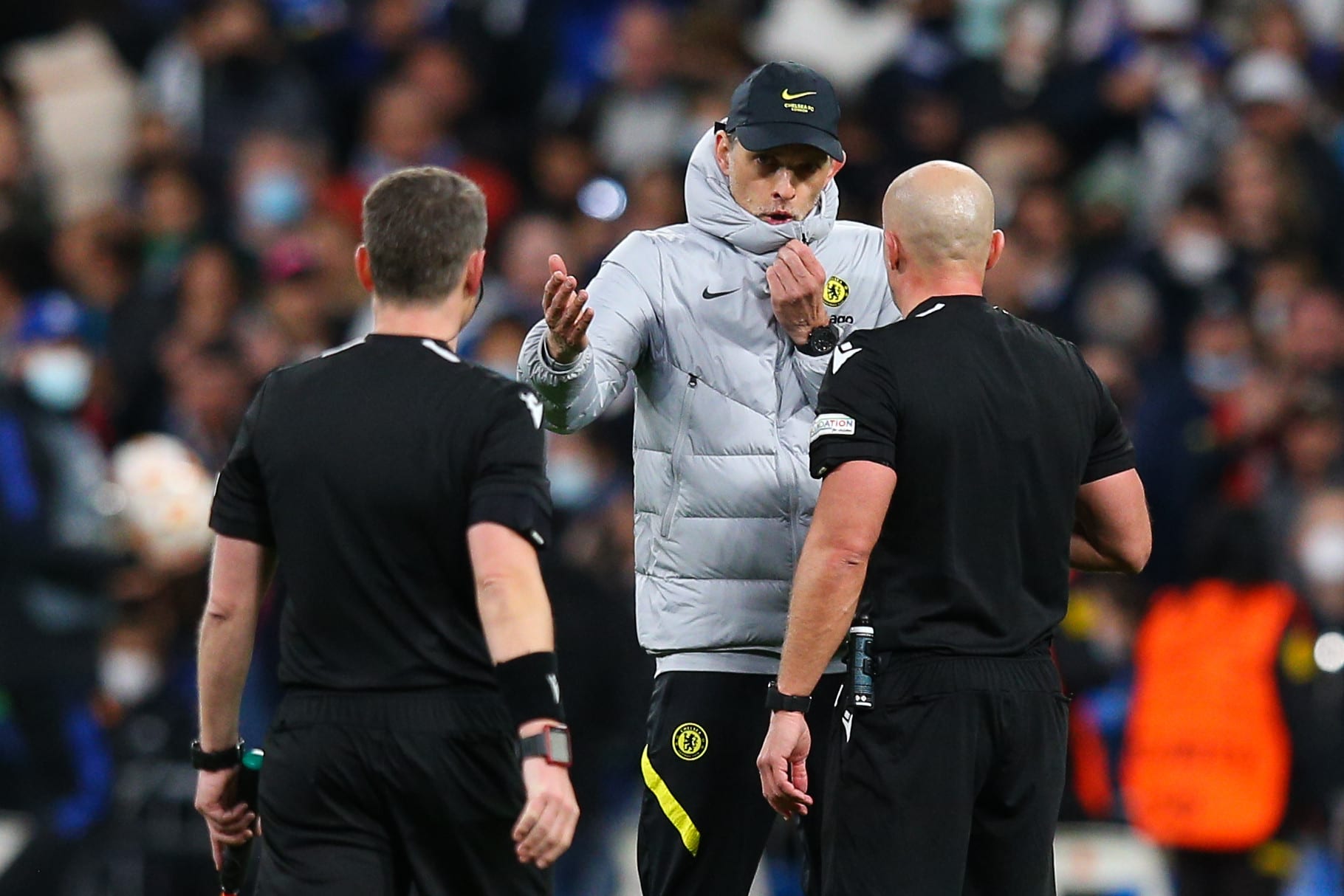 Chelsea coach Thomas Tuchel talks to the referee after the loss in Madrid