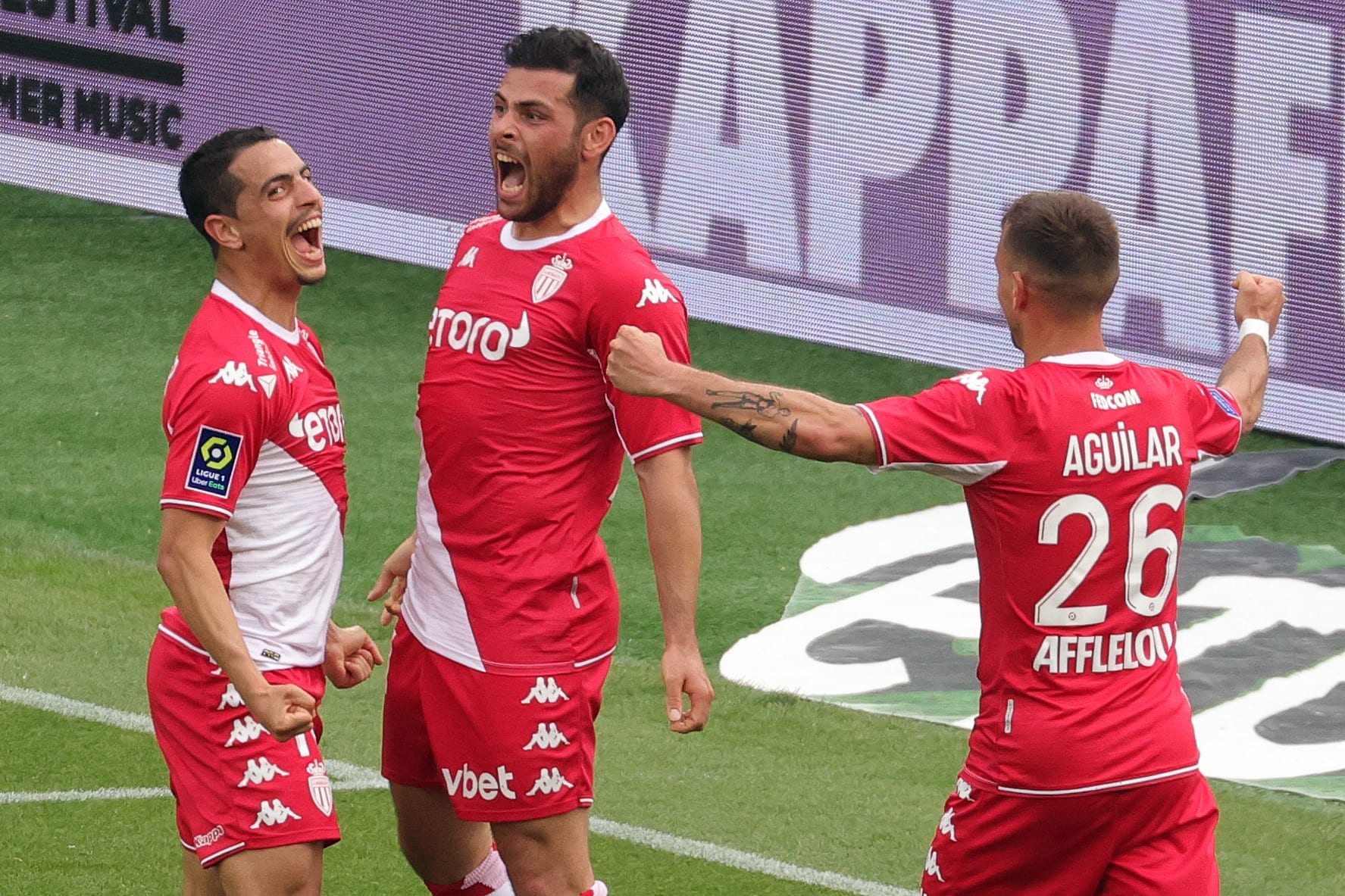 וויסאם בן ידר עם קווין פולנד שחקני מונאקו חוגגים