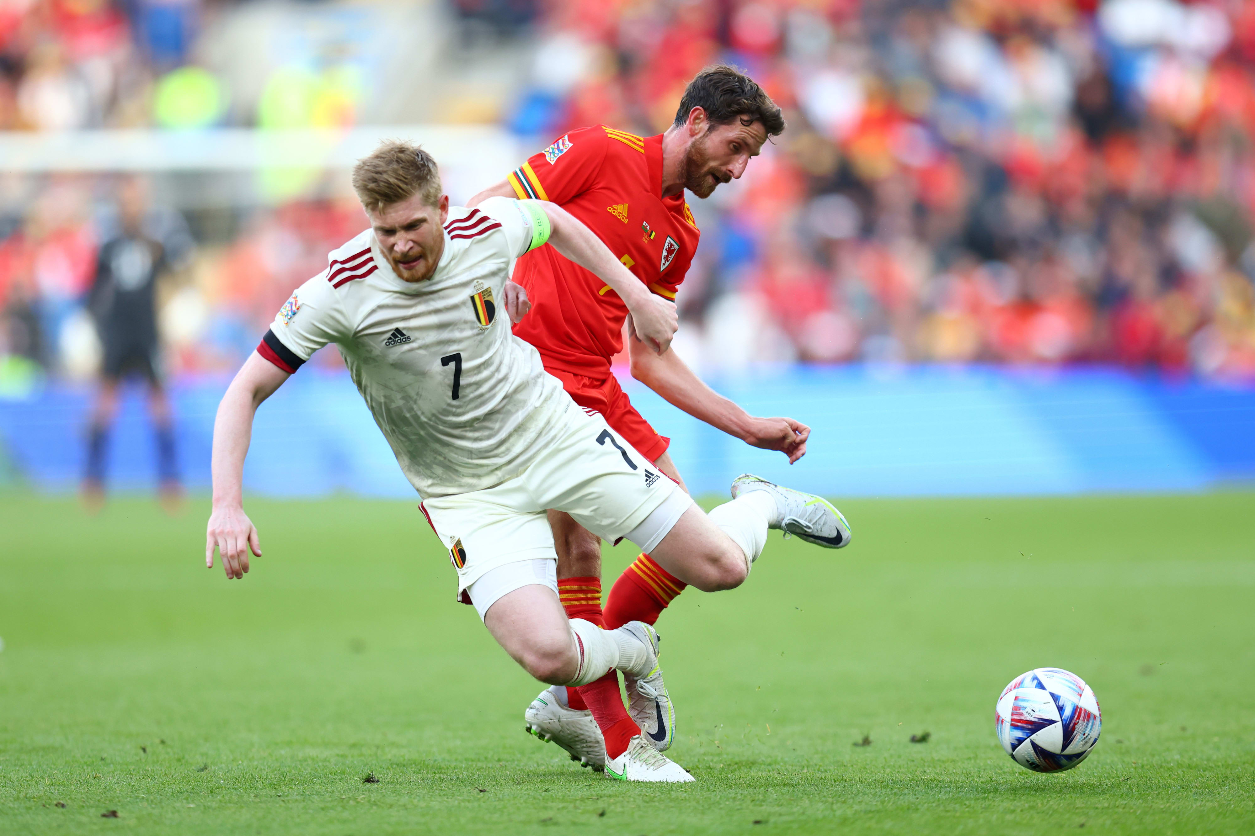 Belgium's Kevin de Bruyne ahead of Wales' Joe Allen