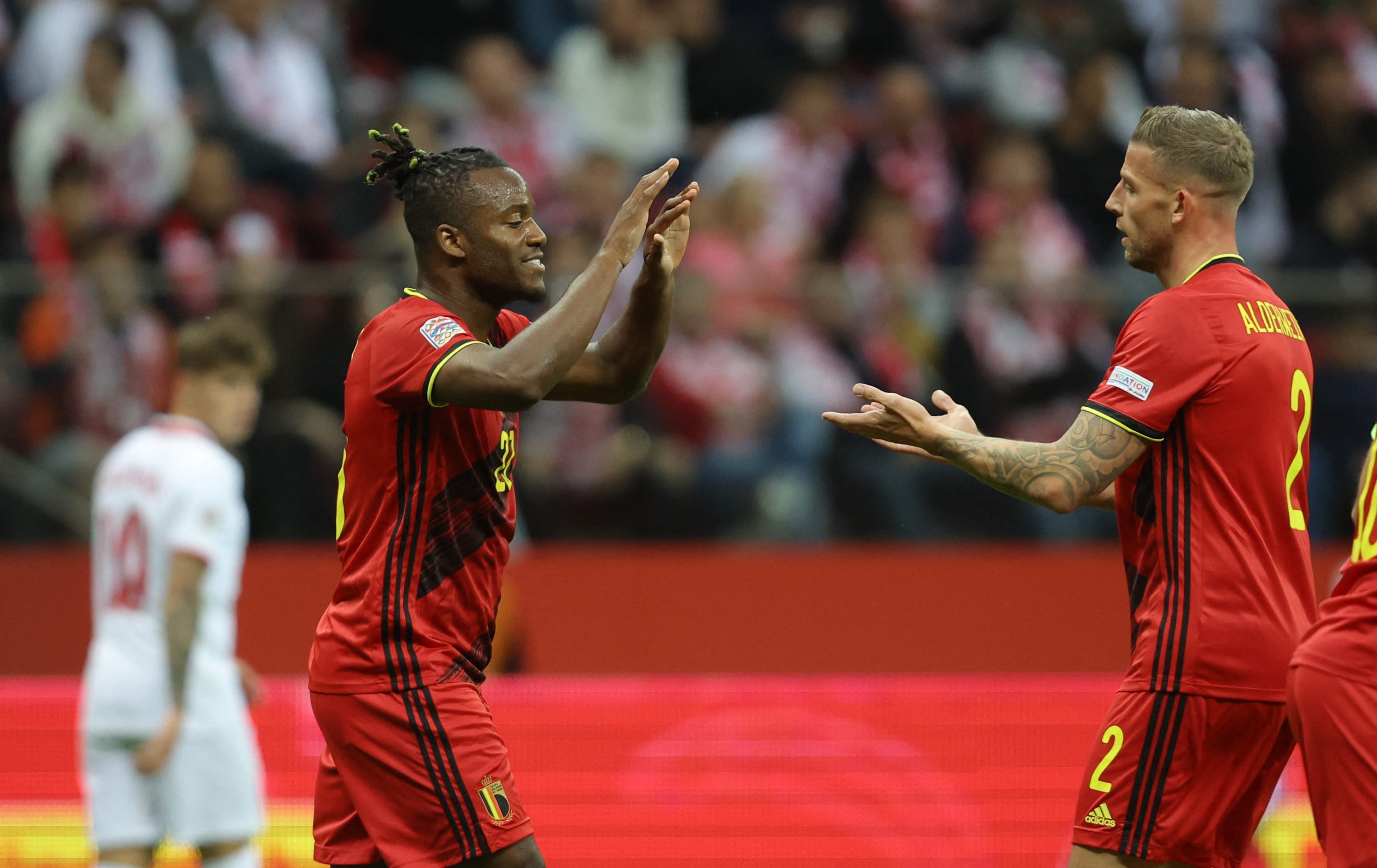 מיצ'י בטשוואי, שחקן נבחרת בלגיה חוגג