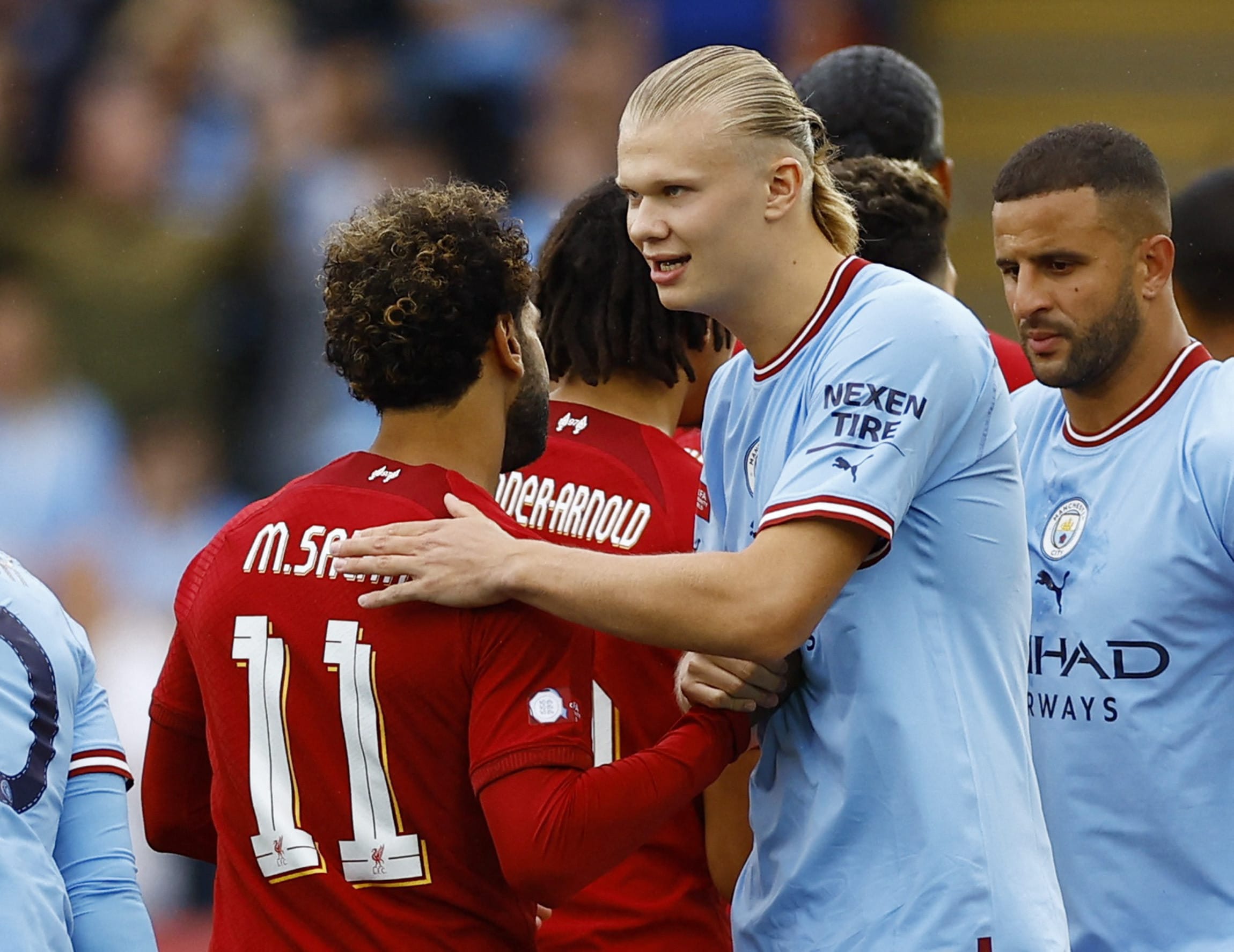 ארלינג הולאנד שחקן מנצ'סטר סיטי עם מוחמד סלאח שחקן ליברפול