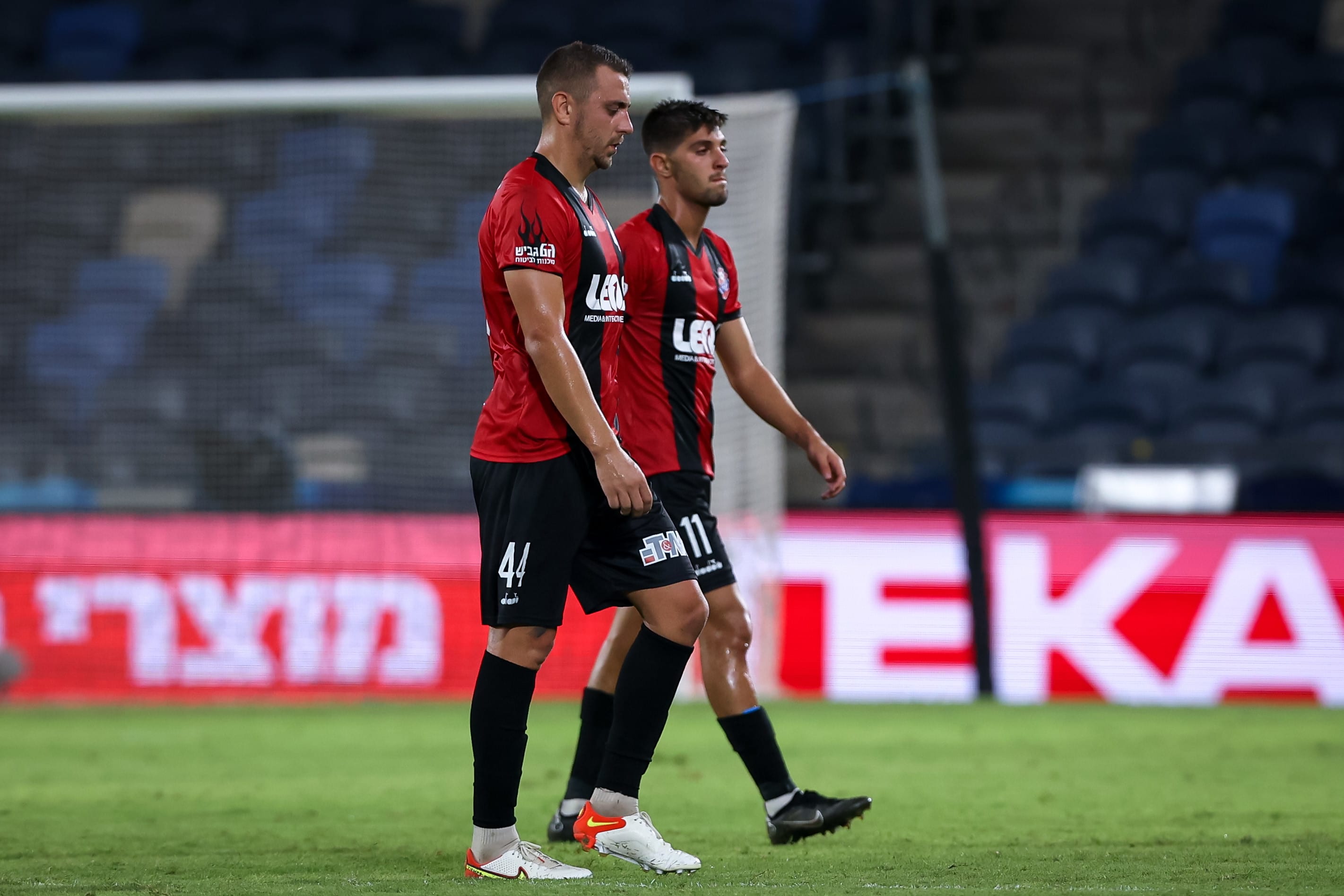 עמית מאיר (מימין) עם אנדריי מירון שחקני הפועל חיפה