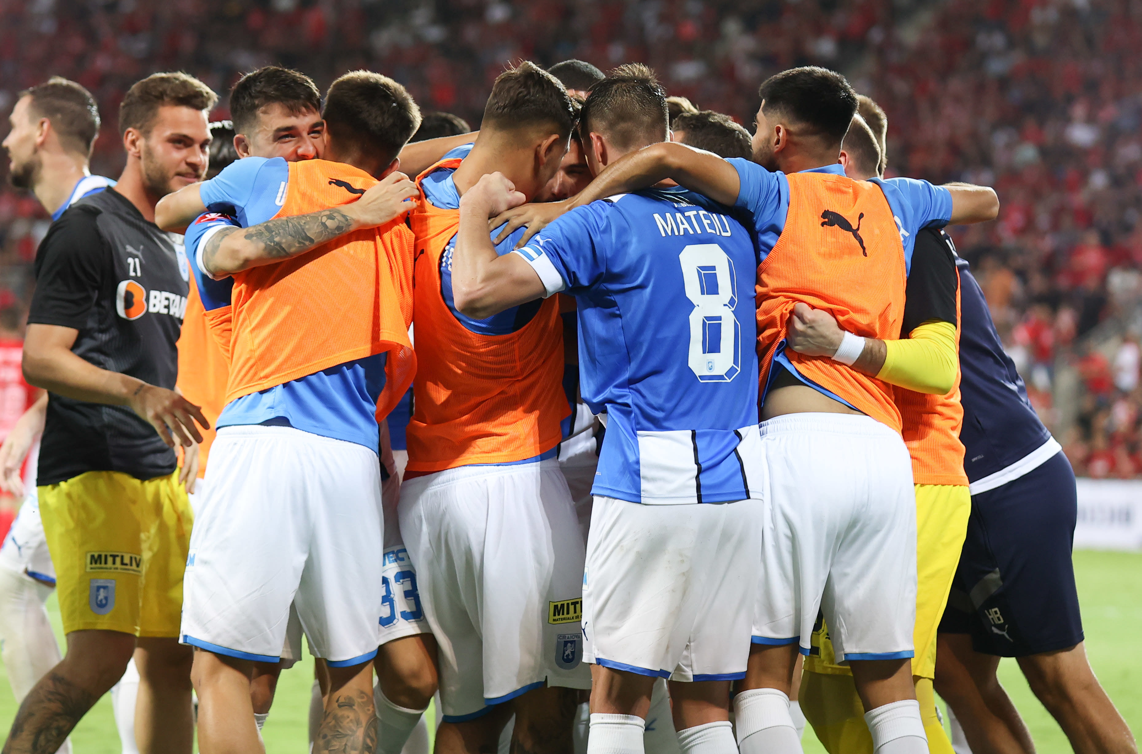 Universitata Craiova players celebrate a goal