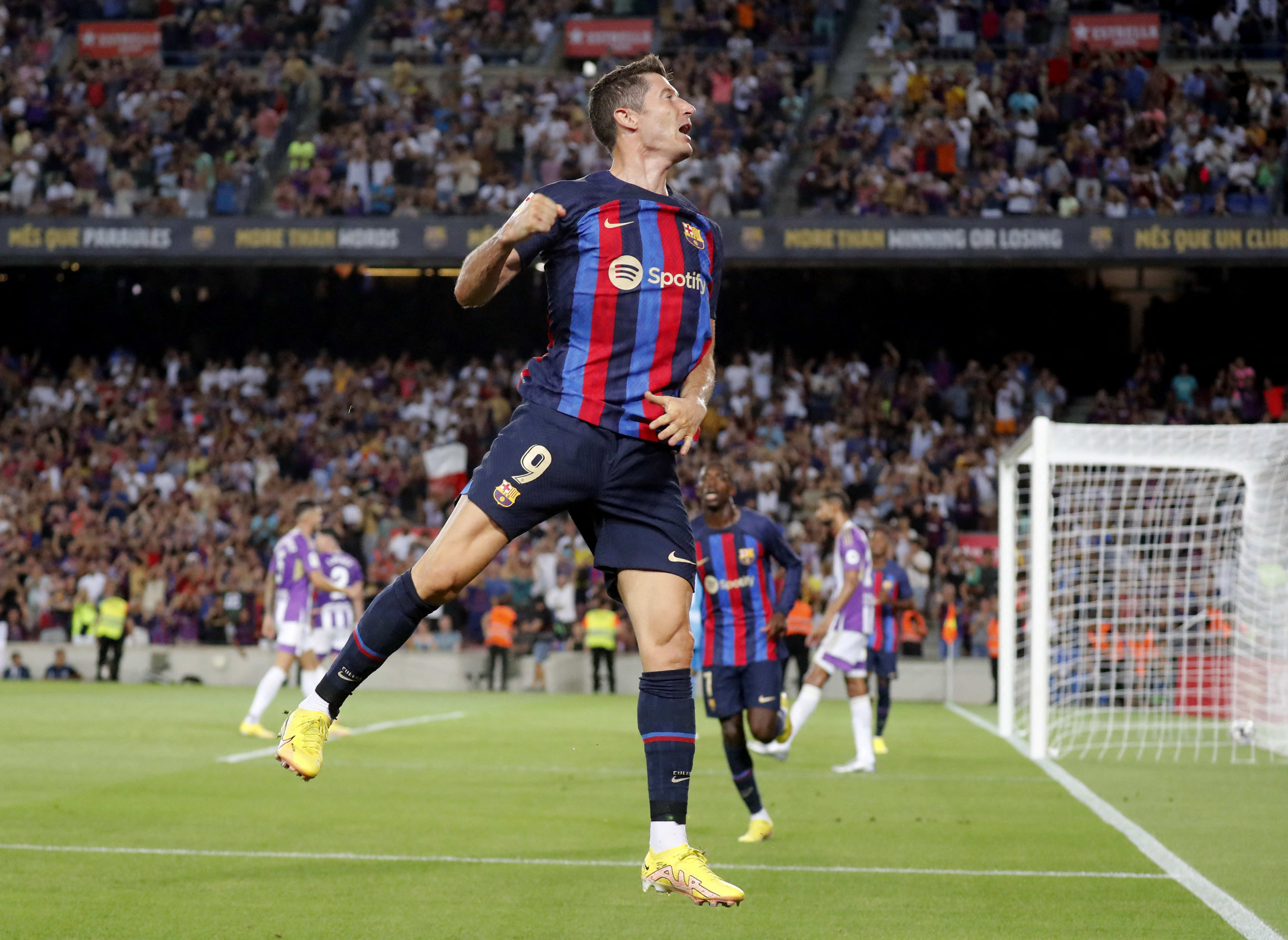 Barcelona player Robert Lewandowski celebrates a goal