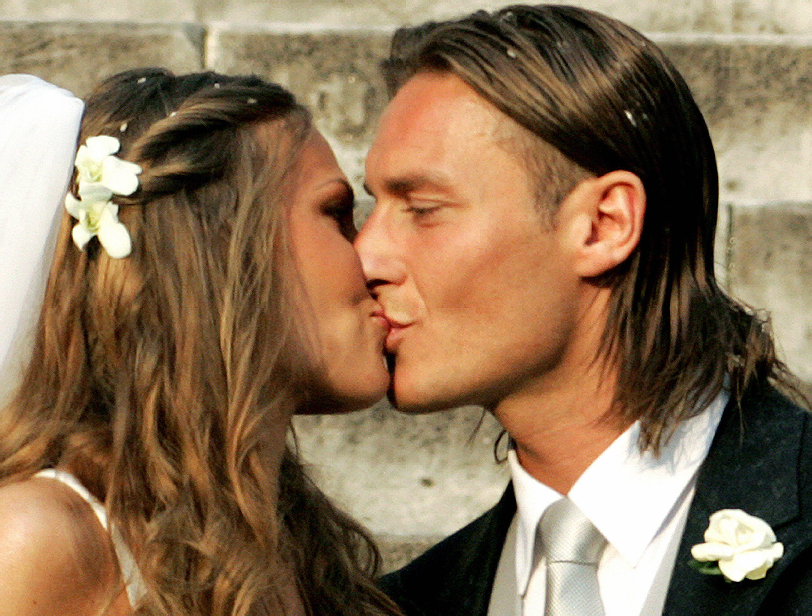 פרננצ'סקו טוטי עם אילארי בלאסי בחתונה שלהם ב-2005