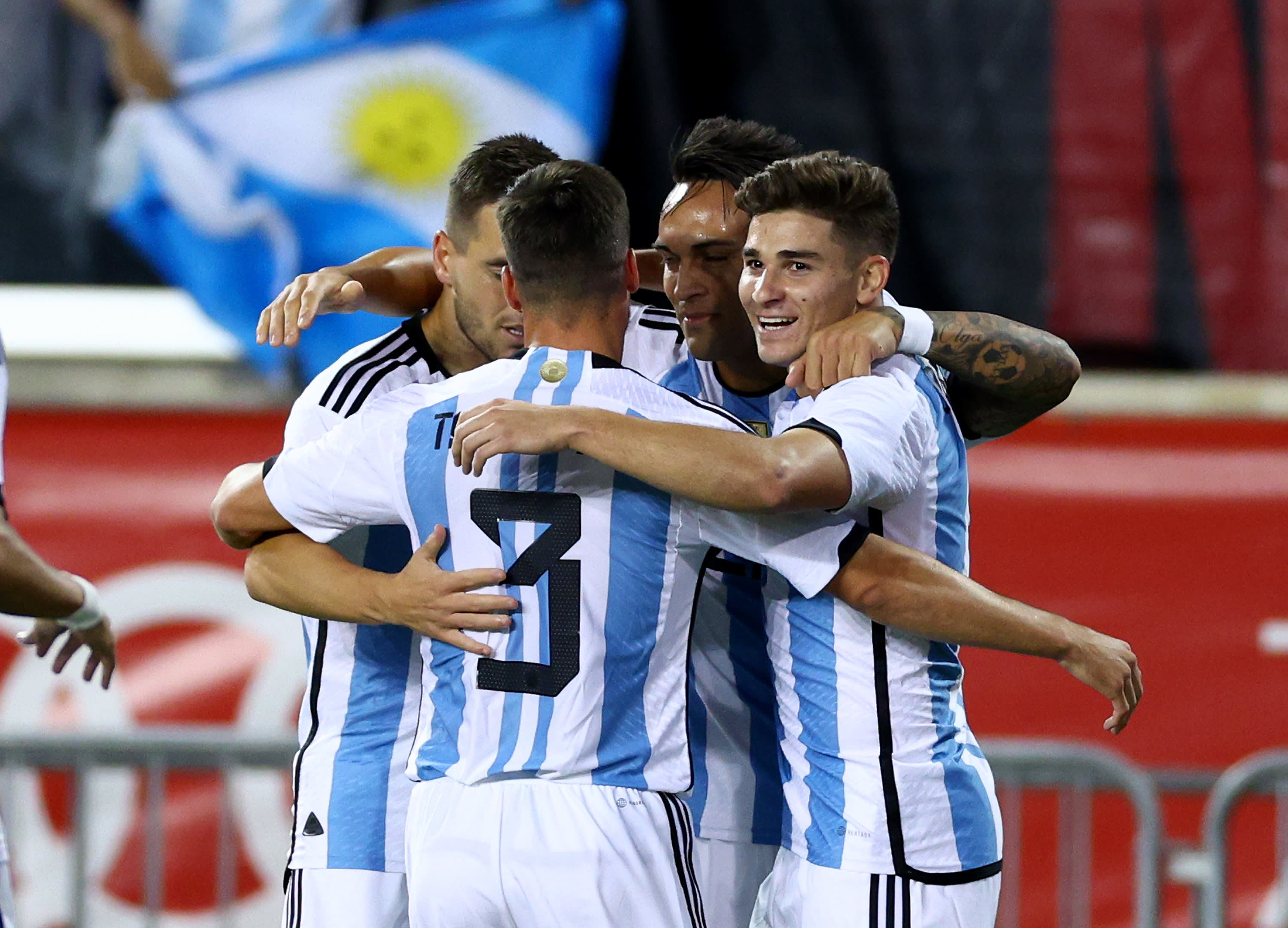 Argentina national team players celebrate with Julián Alvarez