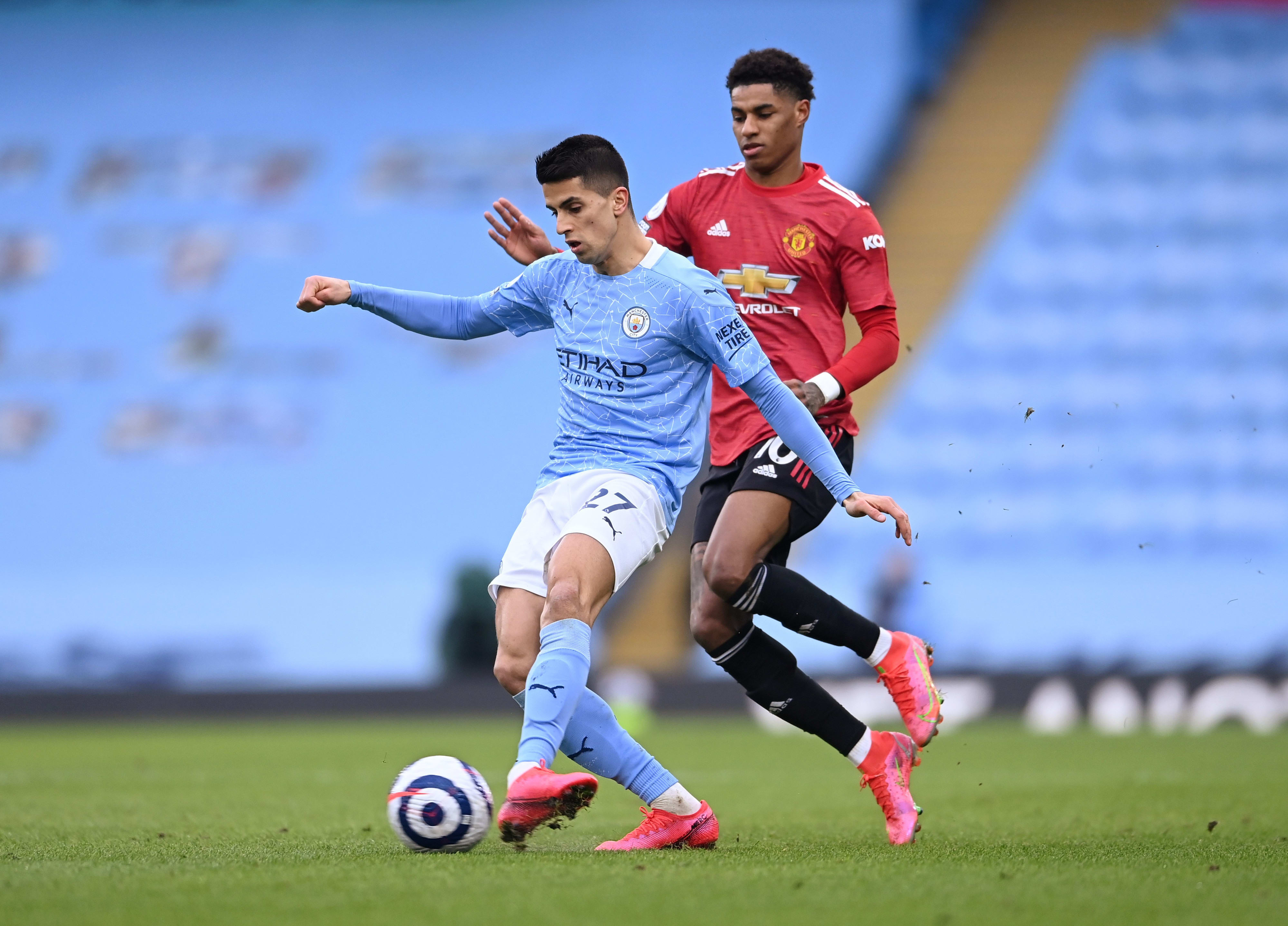 שחקן מנצ'סטר סיטי ז'ואאו קאנסלו לפני שחקן מנצ'סטר יונייטד מרכוס רשפורד