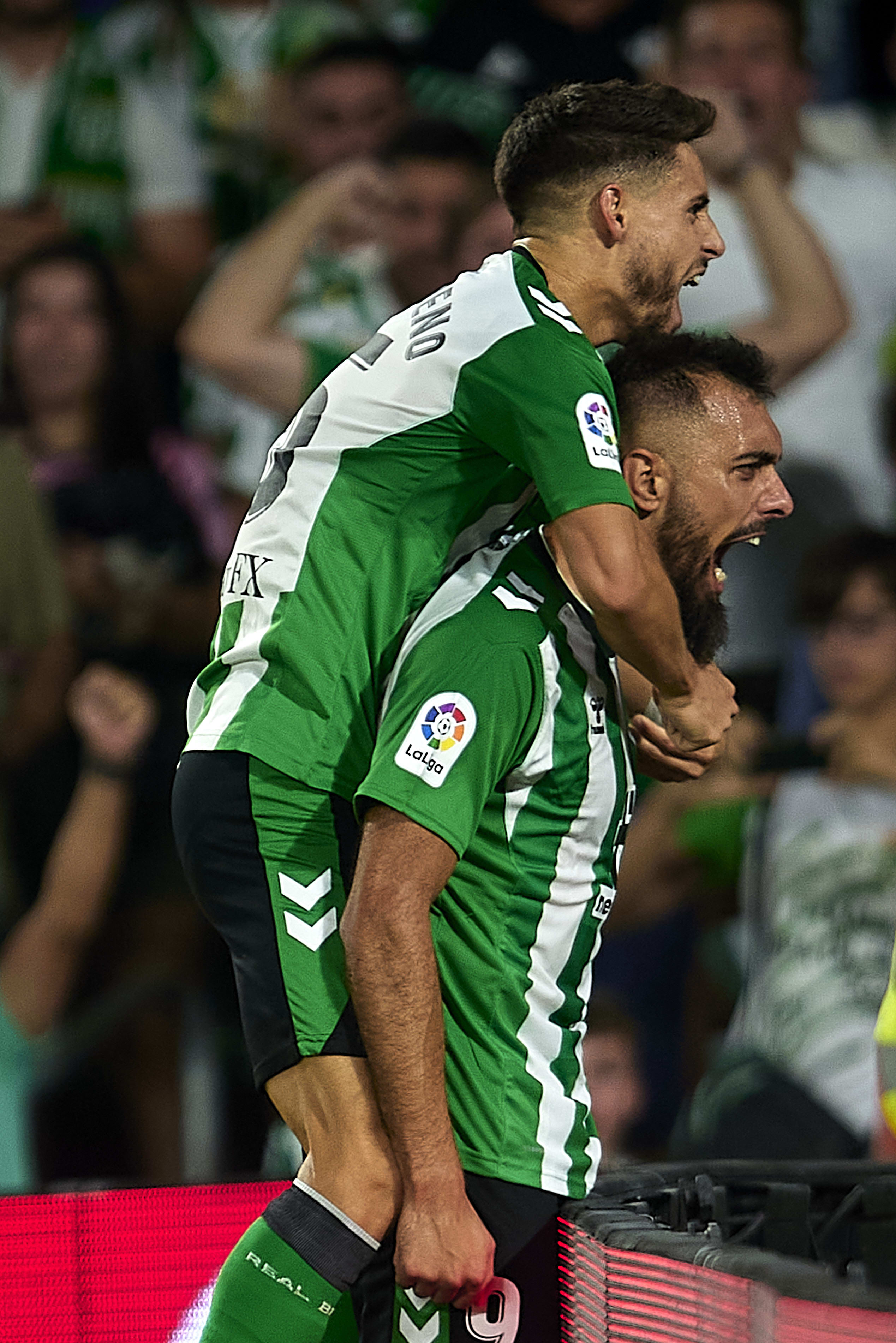 Betis player Borja Iglesias celebrates with Alexander Moreno