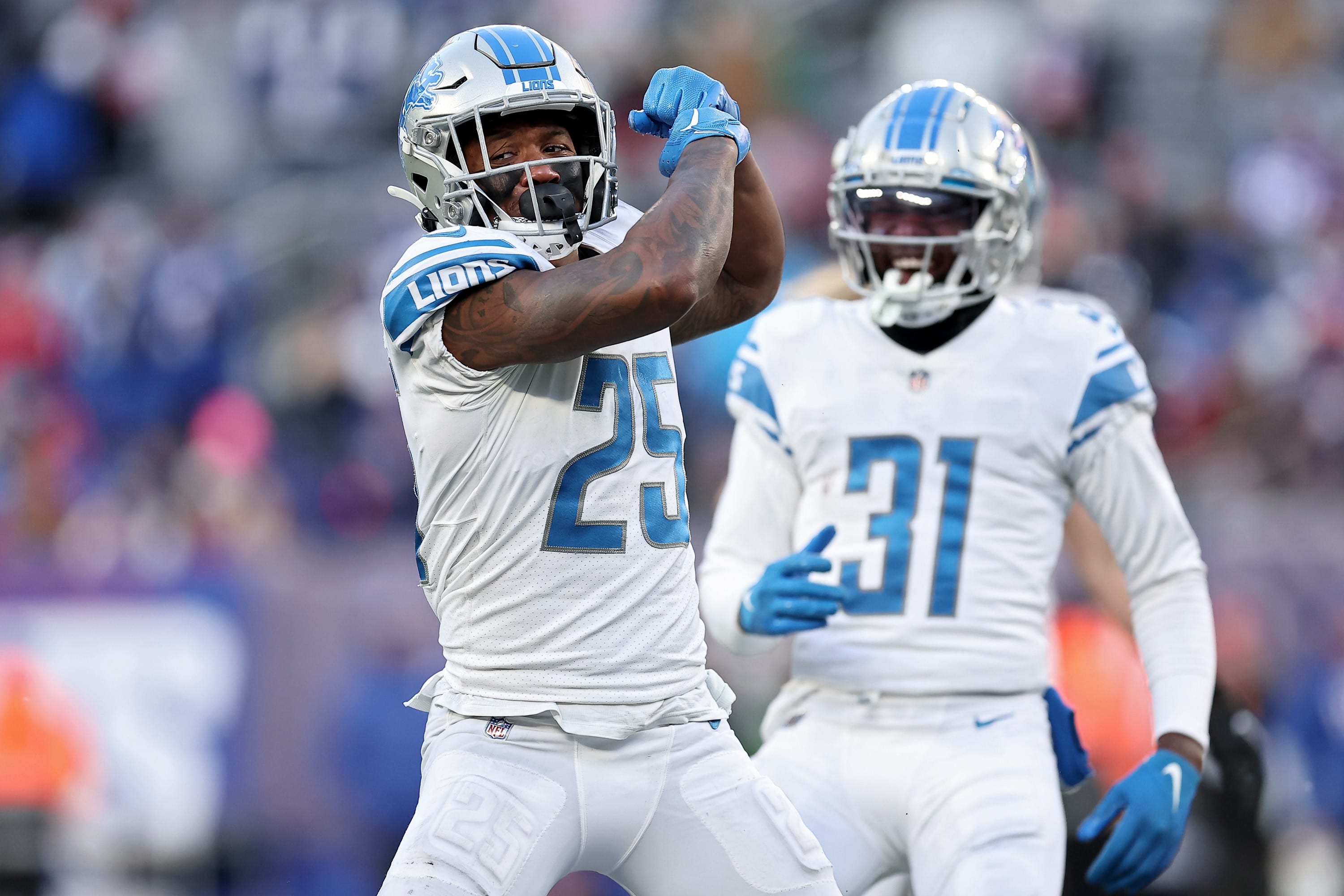 שחקני דטרויט ליונס חוגגים ניצחון על ניו יורק ג'איינטס