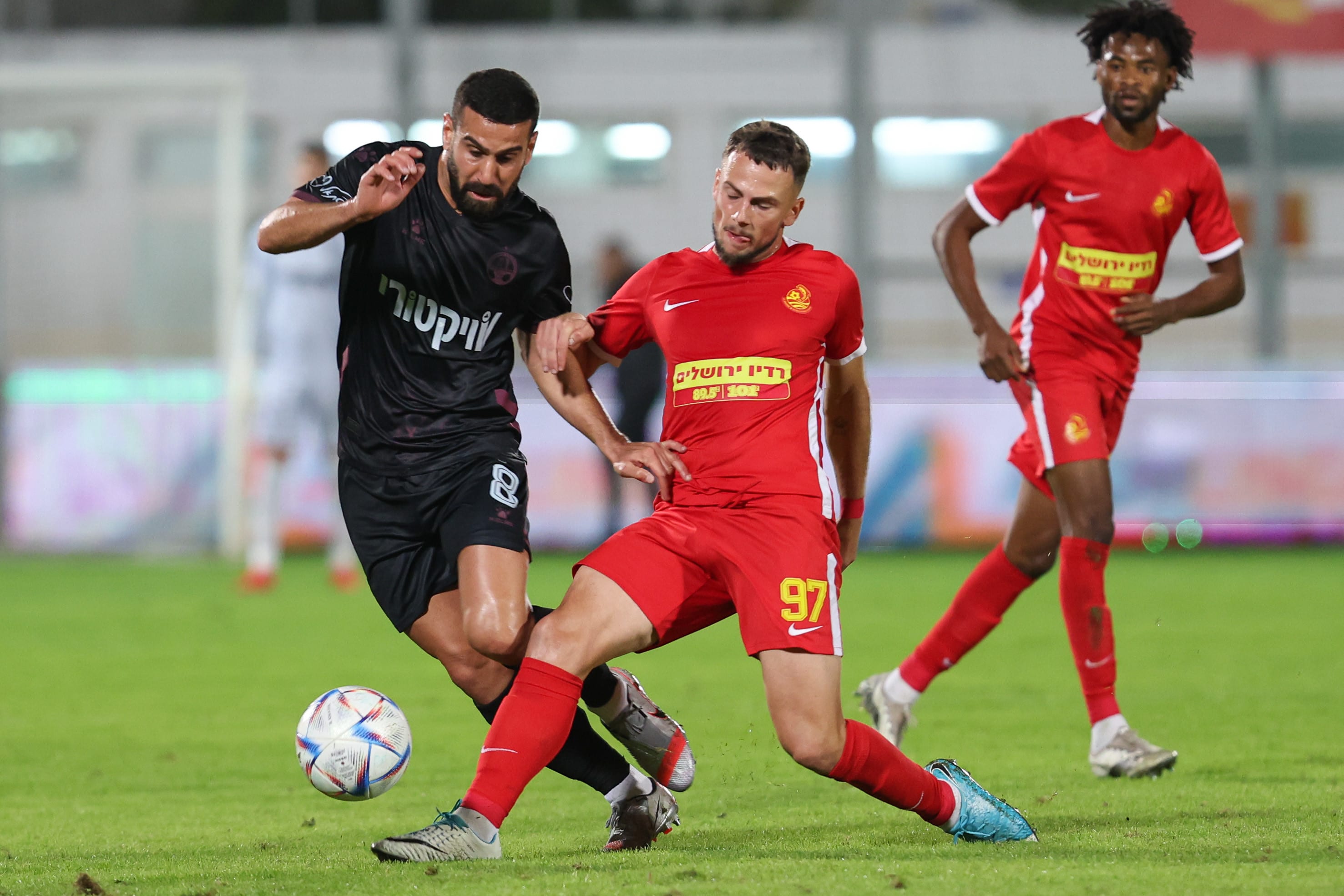 MS player  Ashdod, Jordan Saban, against Hapoel Beer Sheva player, Roy Gordana