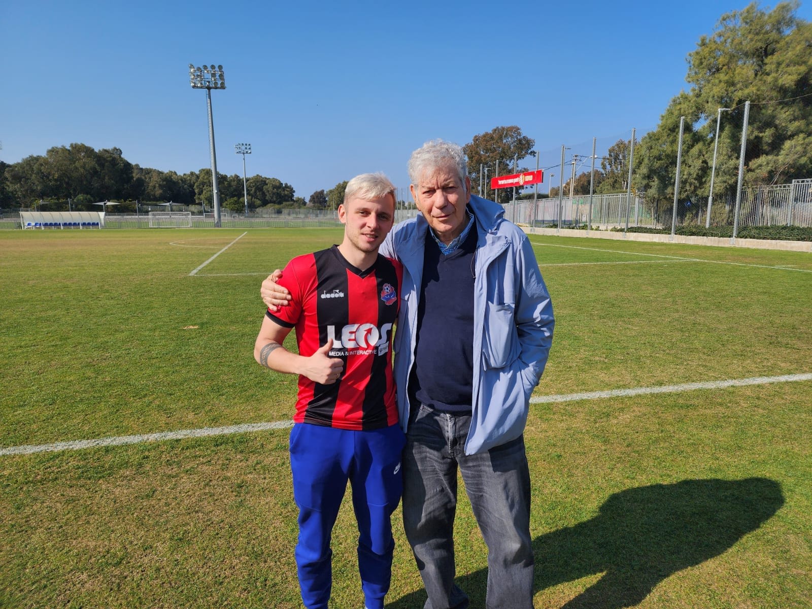 ארווידאס נוביקובאס עם בעלי הפועל חיפה יואב כץ