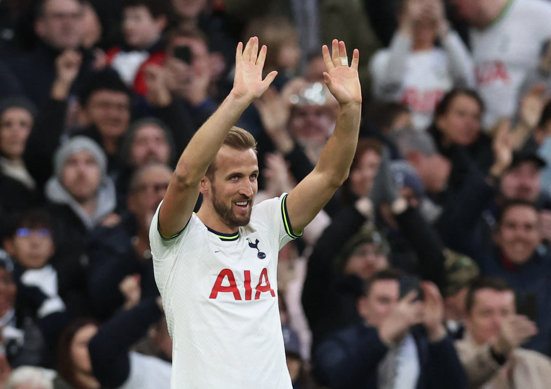 Harry Kane celebrates being Tottenham's all-time top scorer