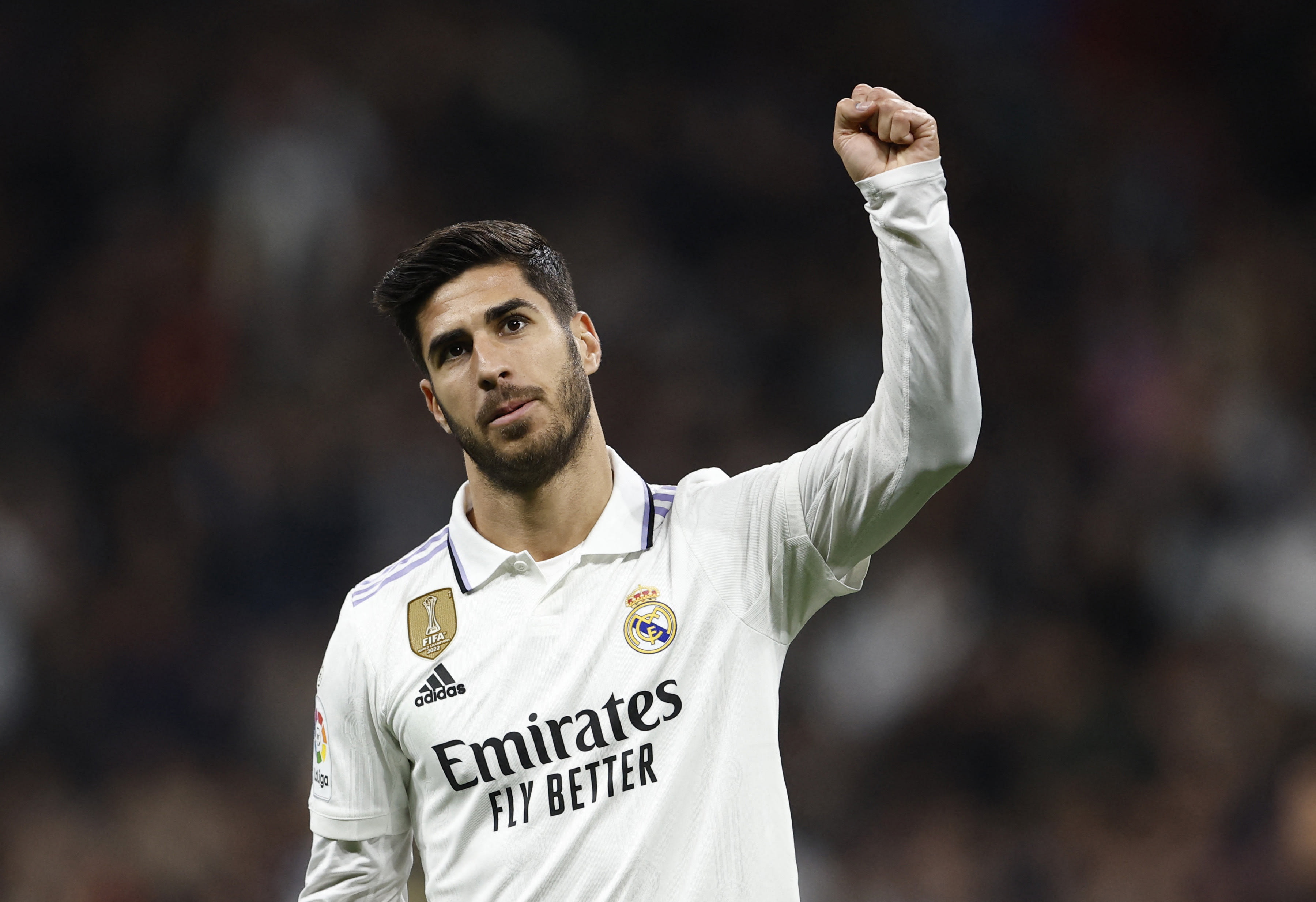 Real Madrid player Marco Asensio celebrates