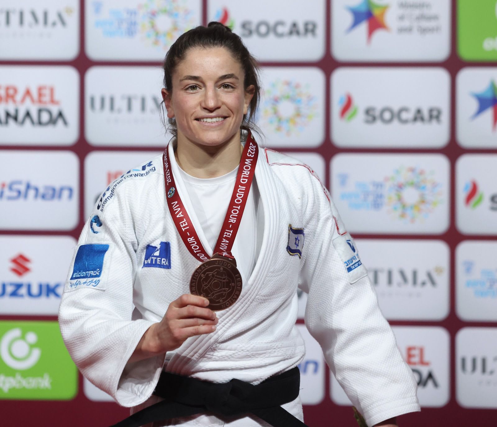 תמנע נלסון לוי עם מדליית הארד בגרנד סלאם תל אביב