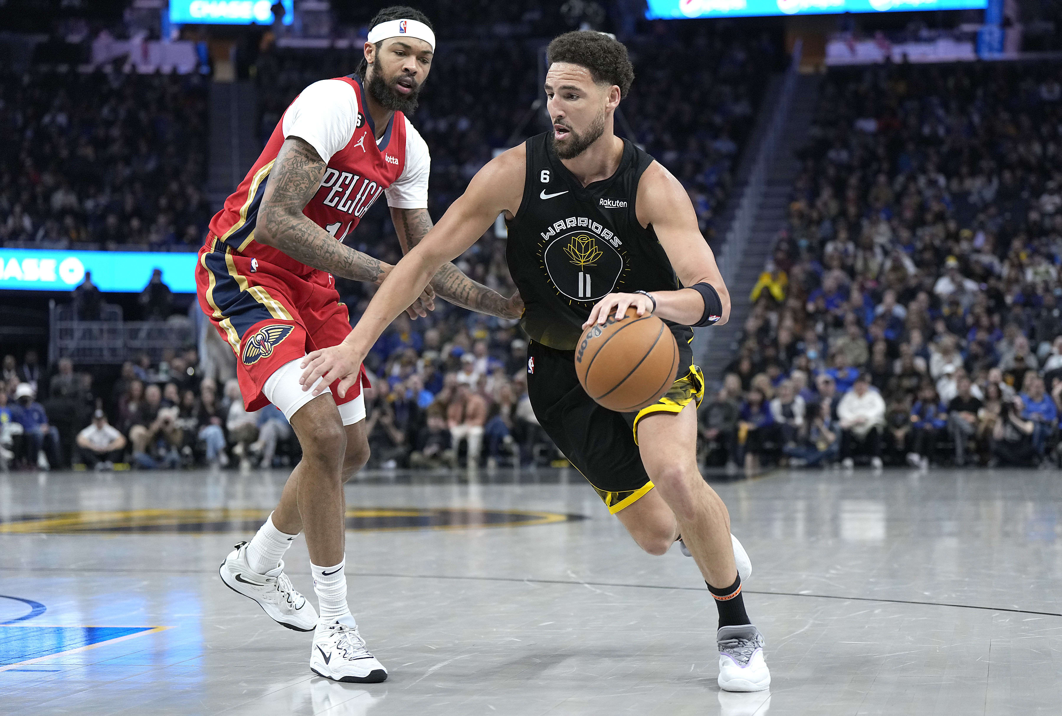 שחקן גולדן סטייט ווריירס קליי תומפסון מול שחקן ניו אורלינס פליקנס ברנדון אינגרם