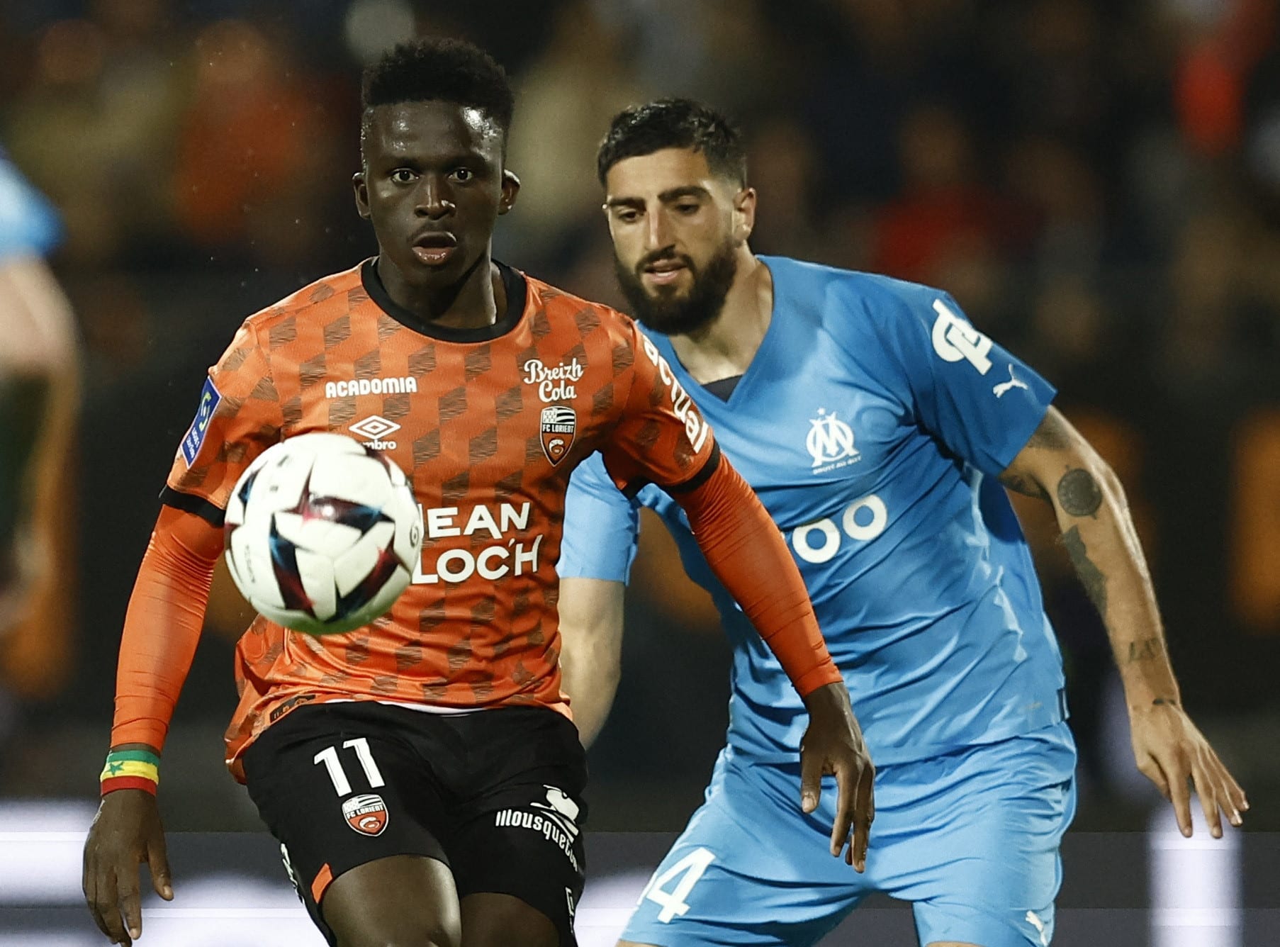 במבה דיינג שחקן לוריין לפני סמואל ז'יגו שחקן מארסיי