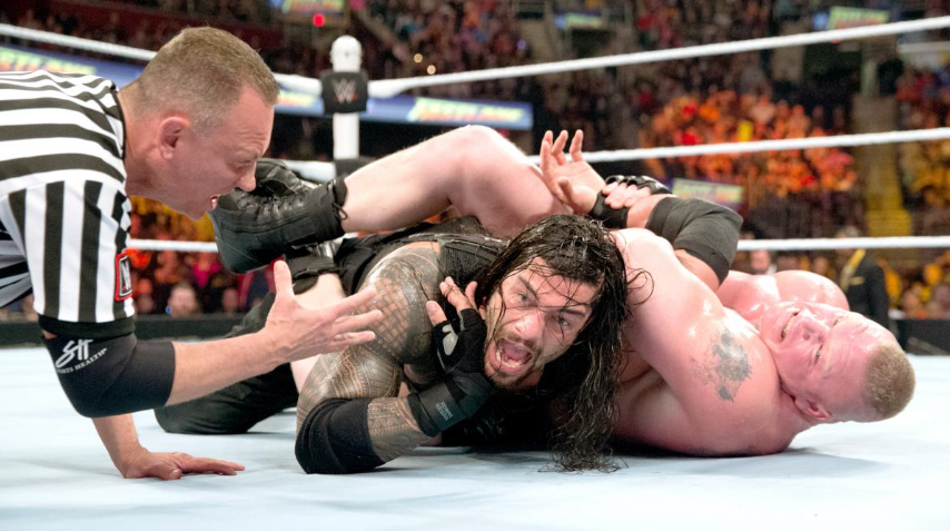 ברוק לסנר ורומן ריינס. WWE