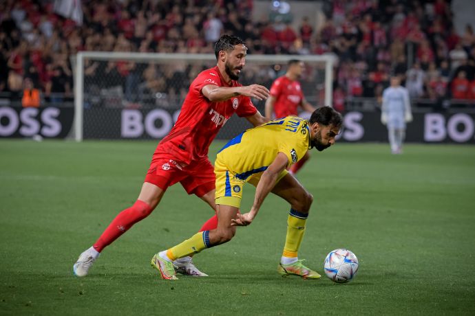 שחקן מכבי תל אביב אופיר דוידזאדה מול שחקן הפועל באר שבע שגיב יחזקאל