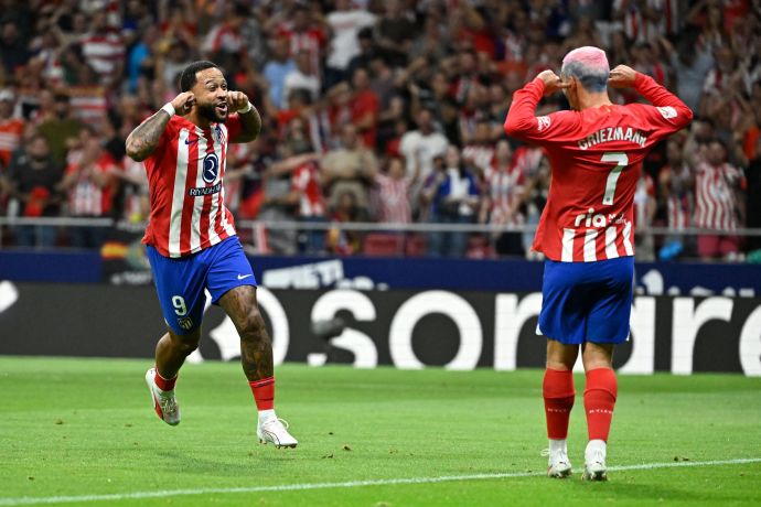 ממפיס דפאי לצד אנטואן גריזמן אתלטיקו מדריד