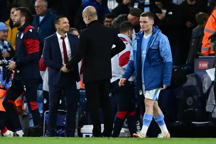 ברק בכר לצד פפ גווארדיולה