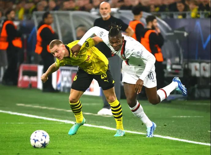 רפאל לאאו מילאן לצד יוליאן ריירסון בורוסיה דורטמונד