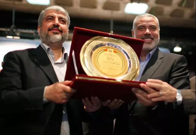 ראש ממשלת חמאס איסמעיל הניה וראש הלשכה המדינית של הארגון חאלד משעל. עזה, 9 בדצמבר 2012