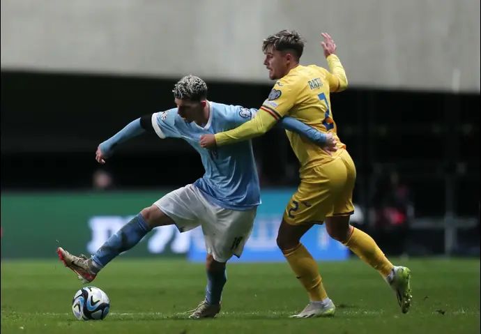 שחקן נבחרת ישראל דור תורג'מן, מול שחקן נבחרת רומניה אנדריי ראציו