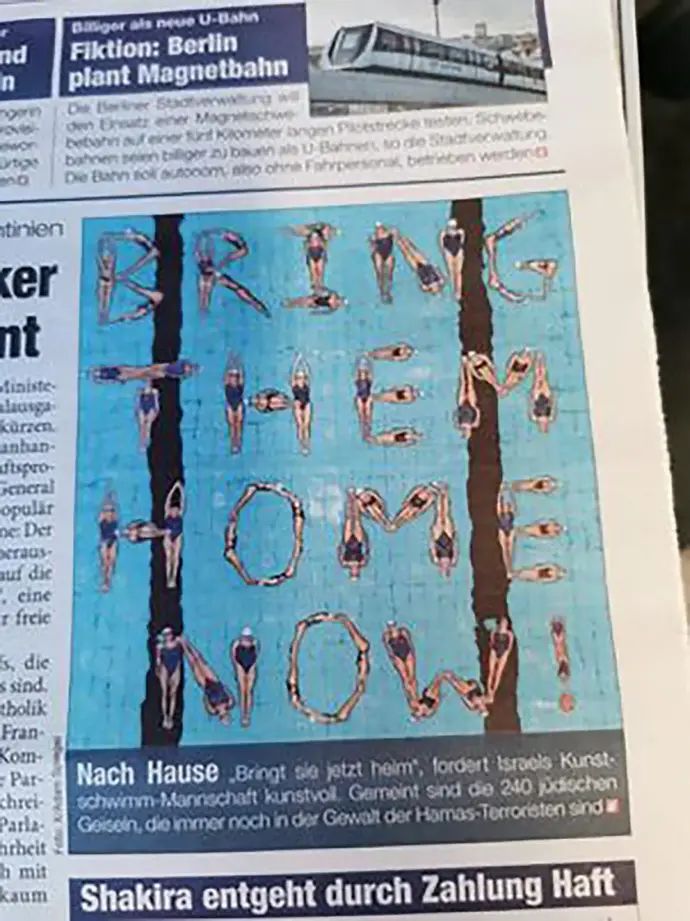 המסר של נבחרת ההתעמלות האמנותית למען החטופים בעמוד השער של עיתון "Heute" האוסטרי