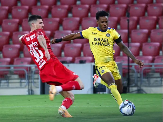 מילסון מכבי תל אביב לצד ניב פליטר הפועל באר שבע