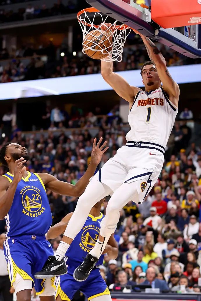 שחקן דנבר נאגטס מייקל פורטר מטביע מול גולדן סטייט