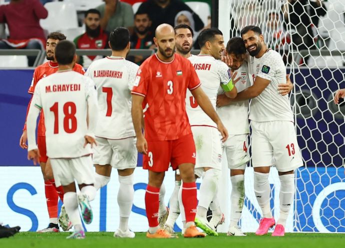 שחקני נבחרת איראן חוגגים מול פלסטין
